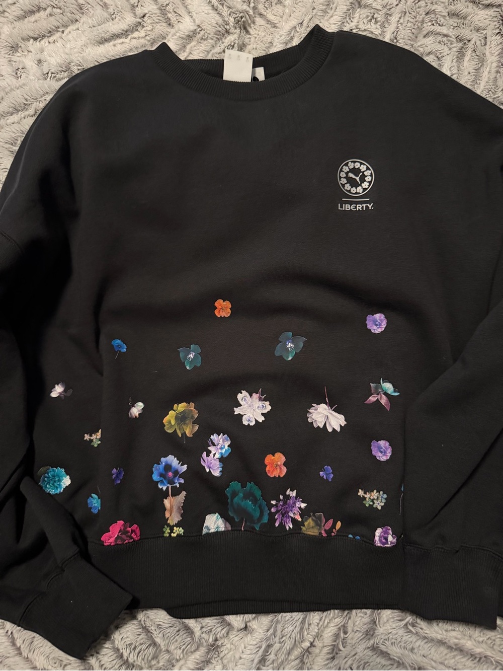 Puma Black Crewneck Sweatshirt with Multicolor Floral Accents